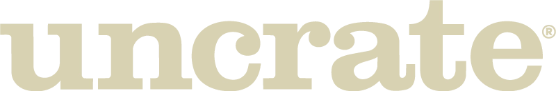 The word uncrate is written in bold, light beige lowercase letters on a light background.
